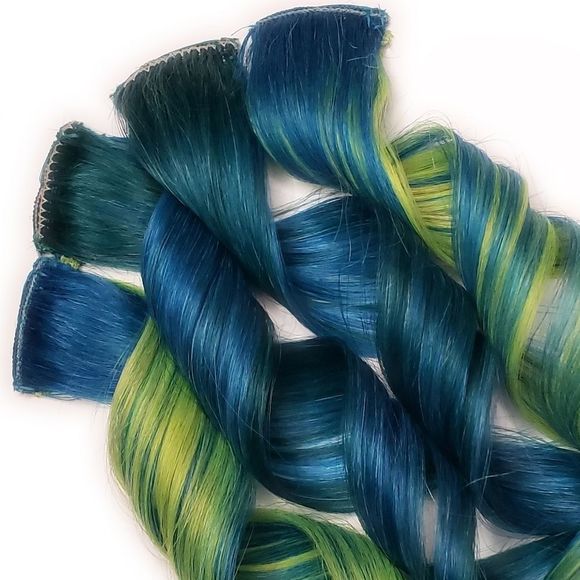 Blue green emerald clip in human hair extensions